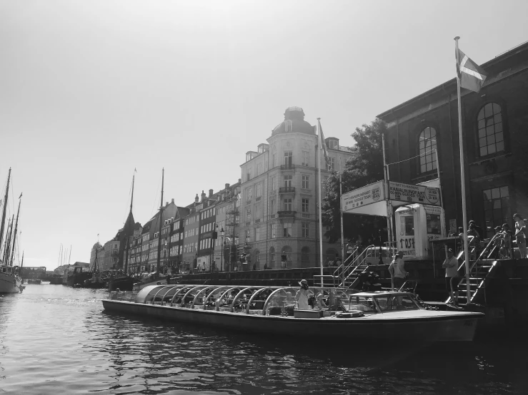 a black and white po of boats and buildings