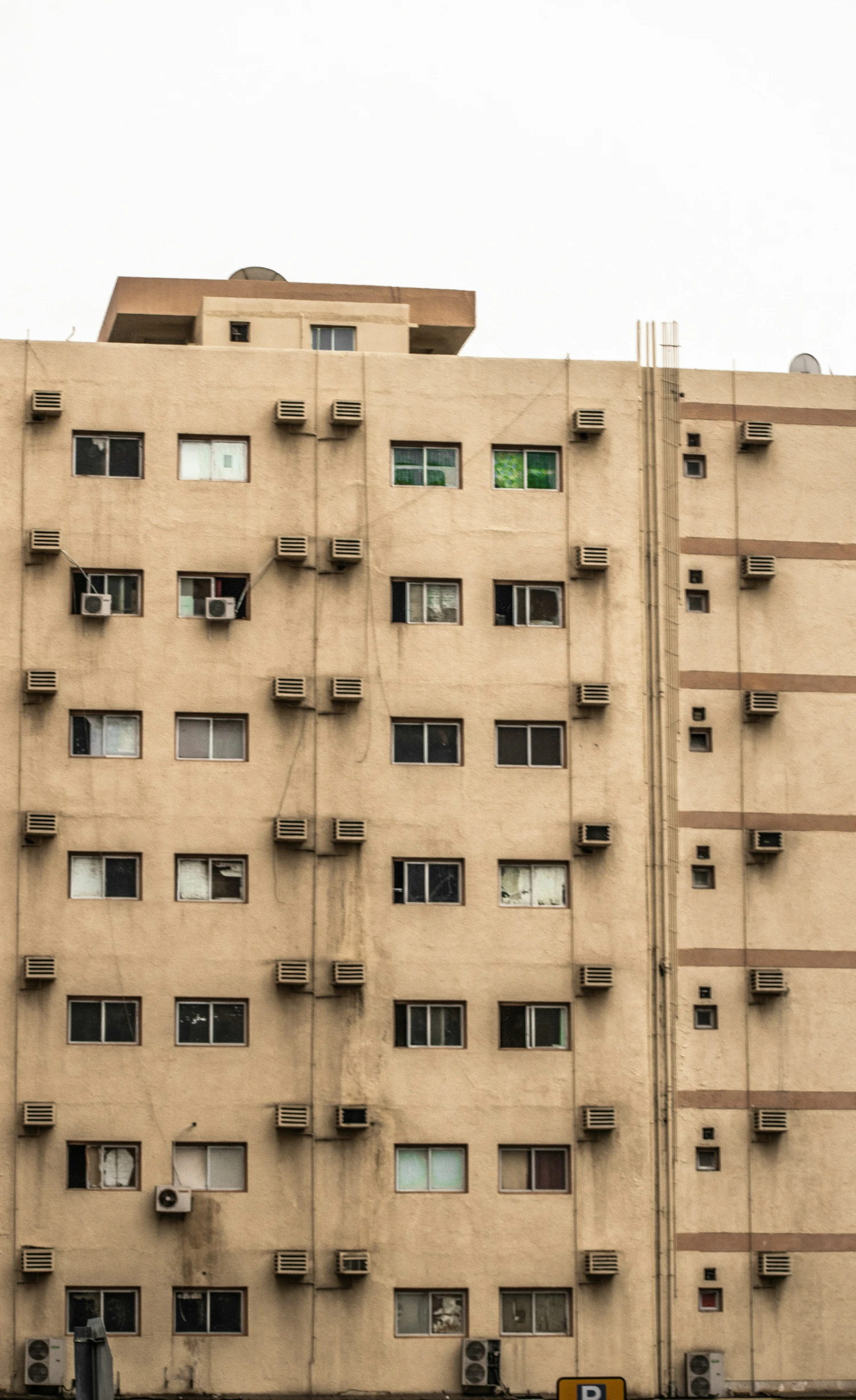 a tall building with windows on it's sides