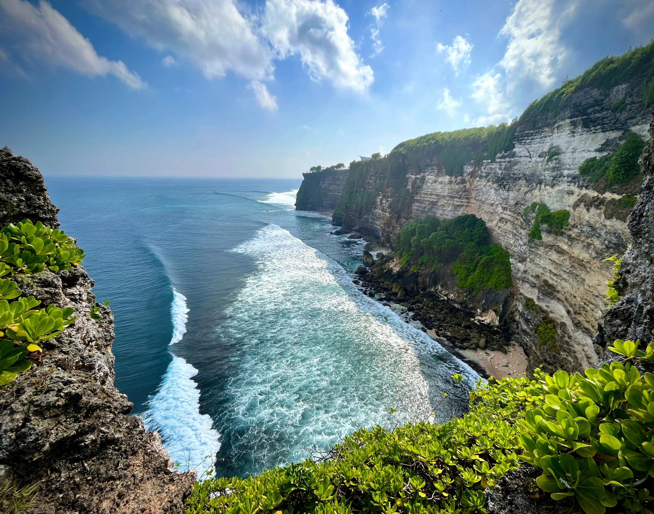 a scenic view of a river and blue water