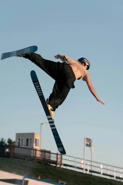 a man on snow board up in the air