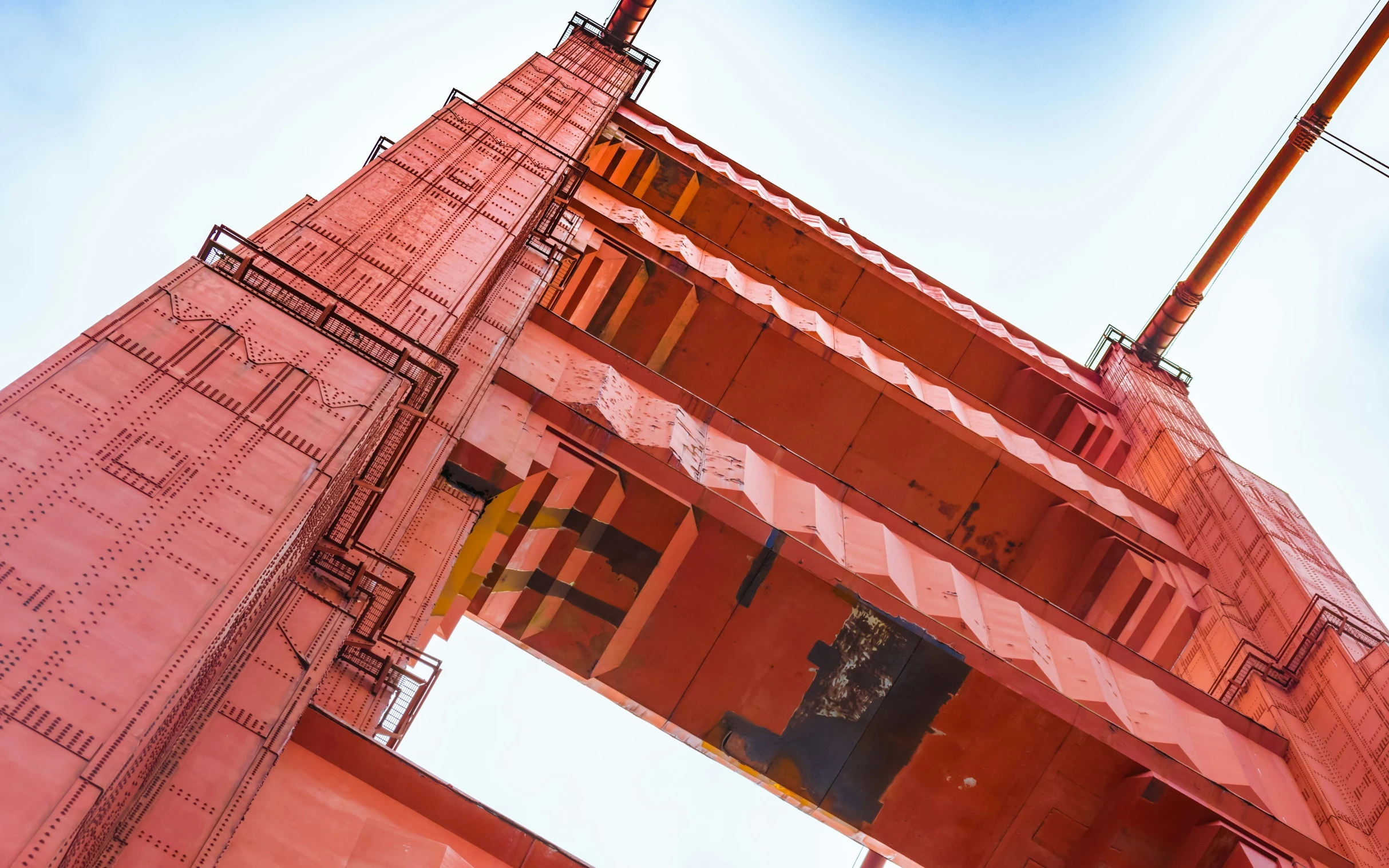 a red building with many windows in front of it