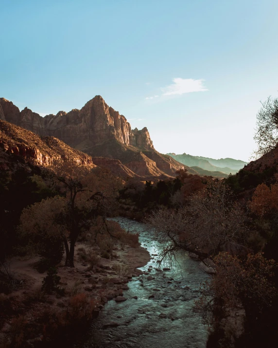 a river in a canyon during the day