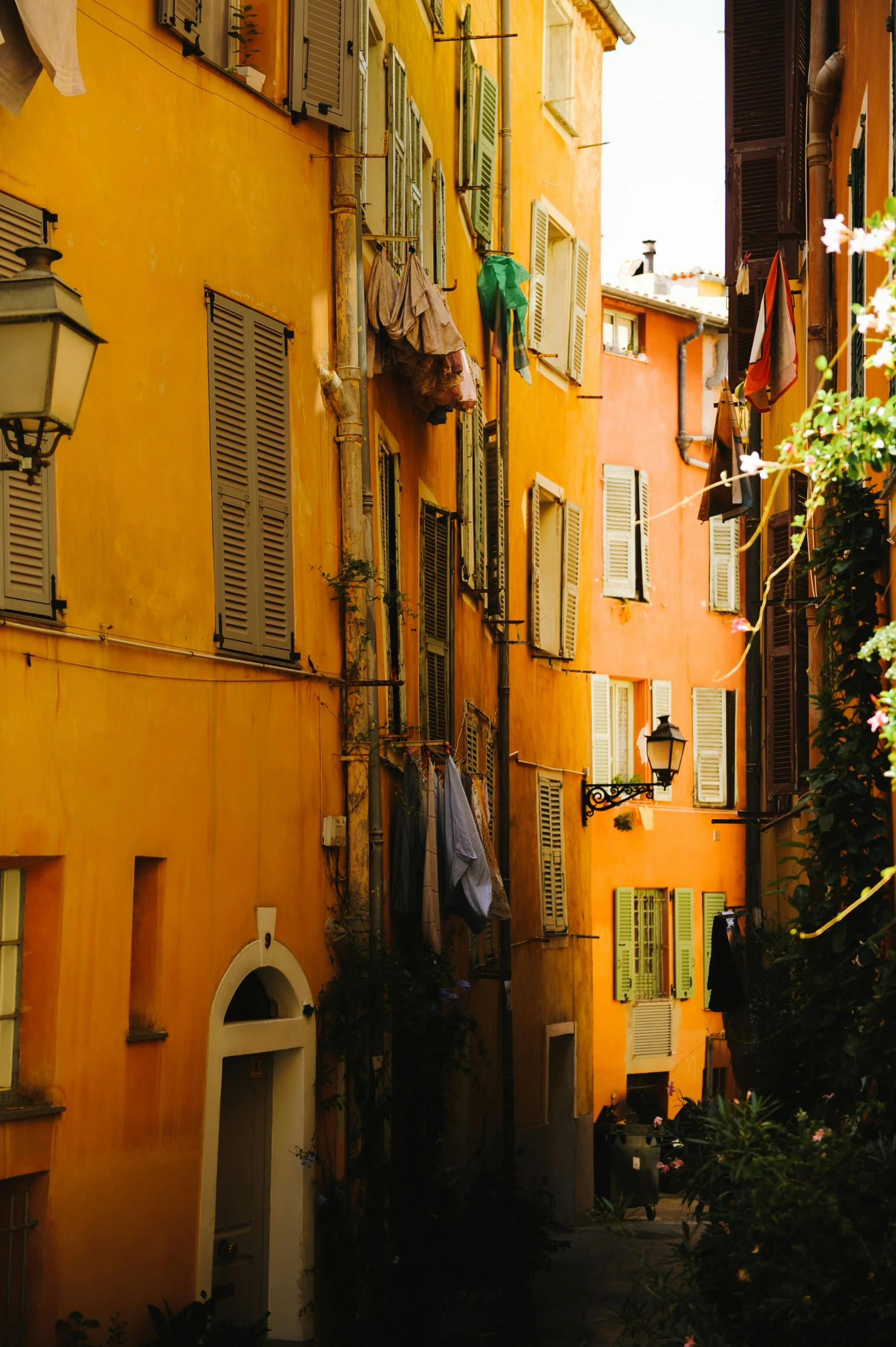 some yellow buildings and a white light with some lights