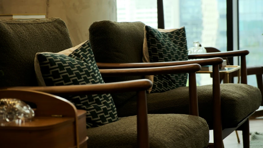 a view from the living room's corner with couches and coffee table