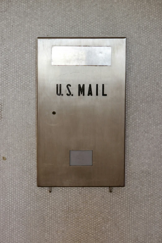 a mail box on the wall that says u s mail