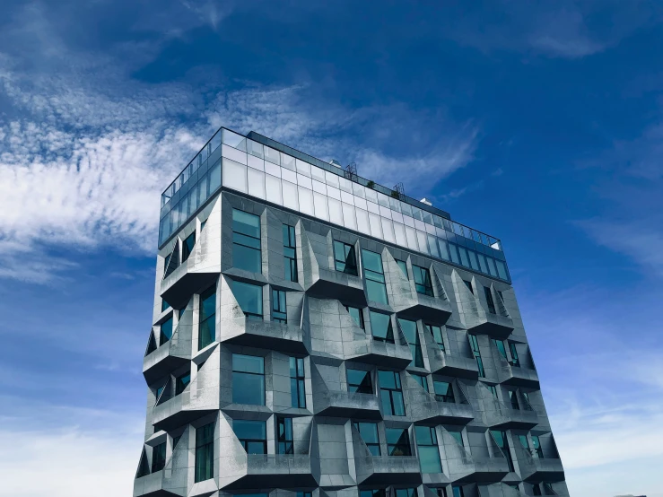 an unusual building made up of many windows