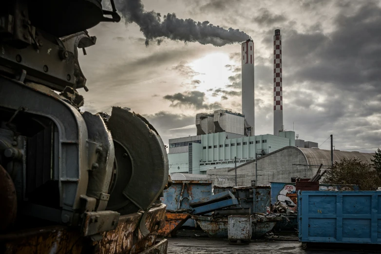 some machinery that are parked next to some buildings