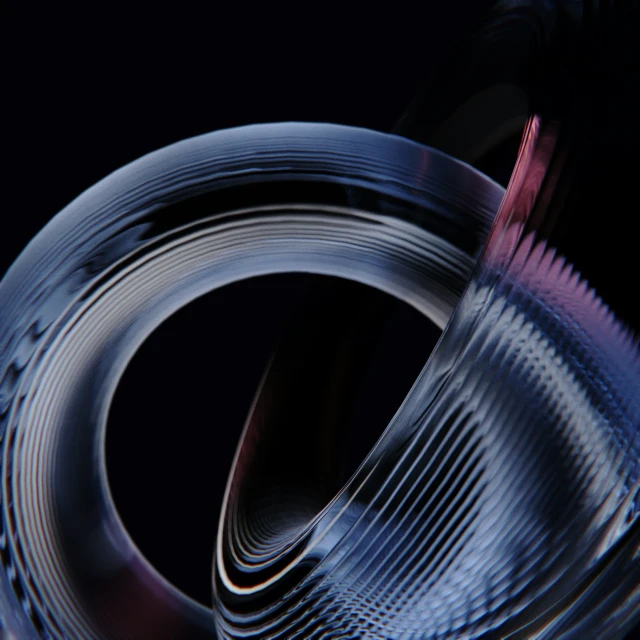 a black background with an abstract image of a circular object