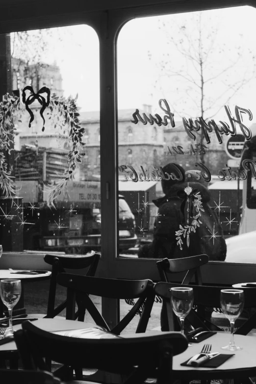 a black and white po of the restaurant front
