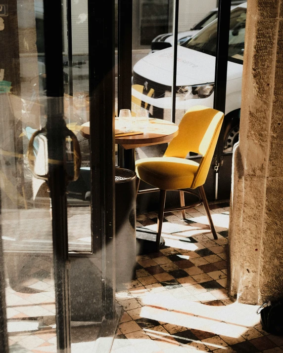 a glass door that leads outside to a restaurant