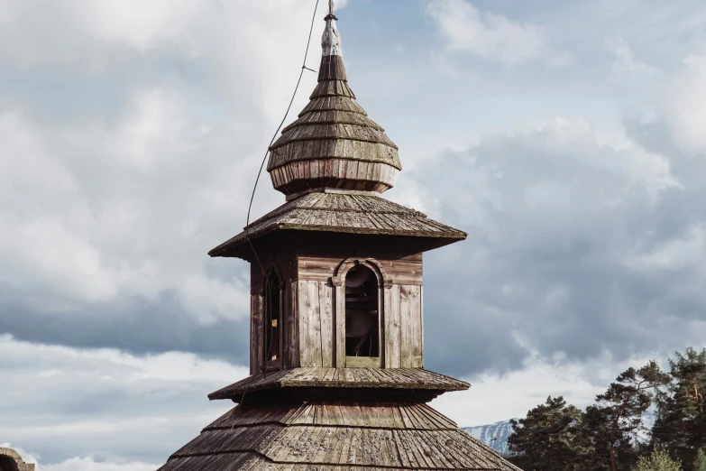 an old building with a small tower with a clock