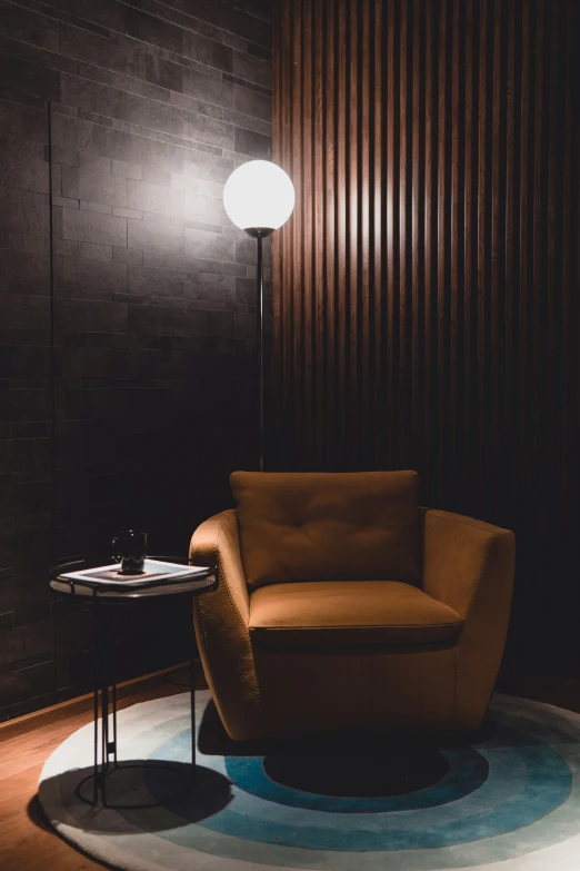 this is a circular living room with brown furniture