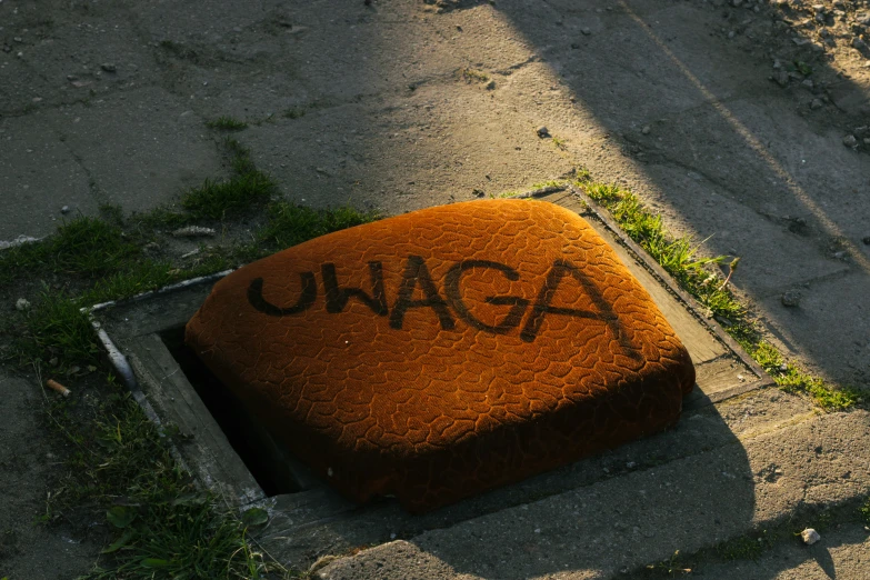 a brick with the word unga written on it