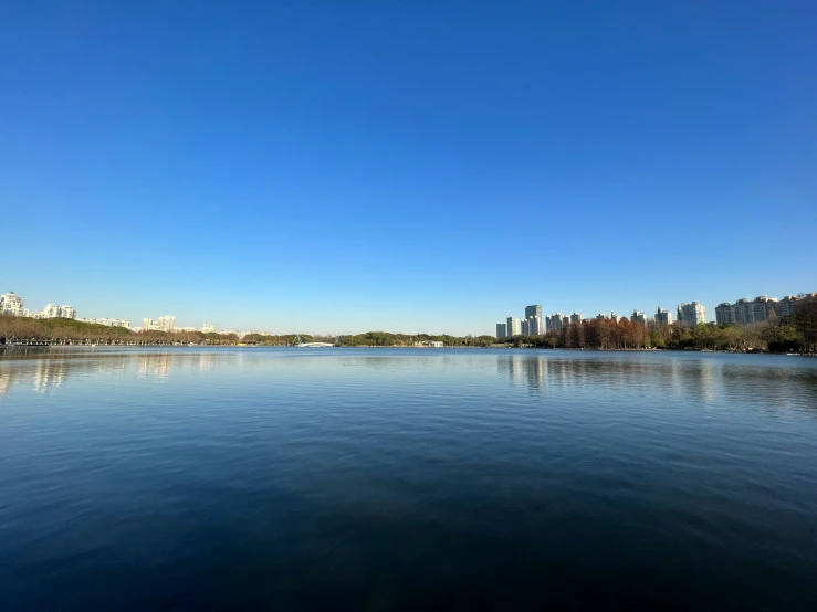 a large body of water surrounded by a city