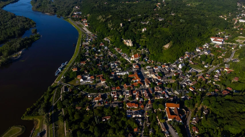 an aerial view of a city near the water