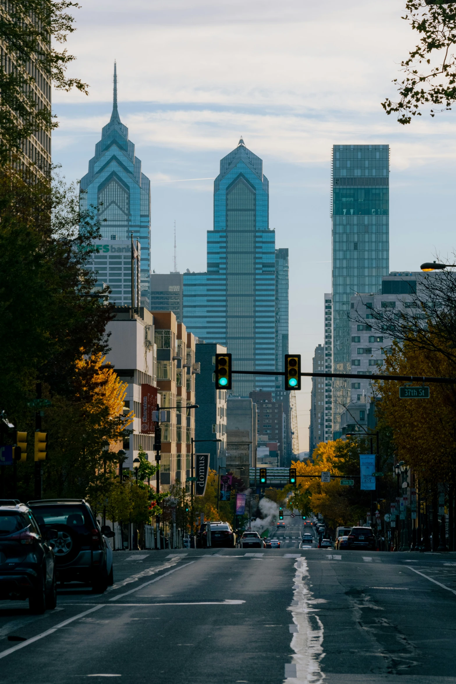 view of a city from an intersection of a street