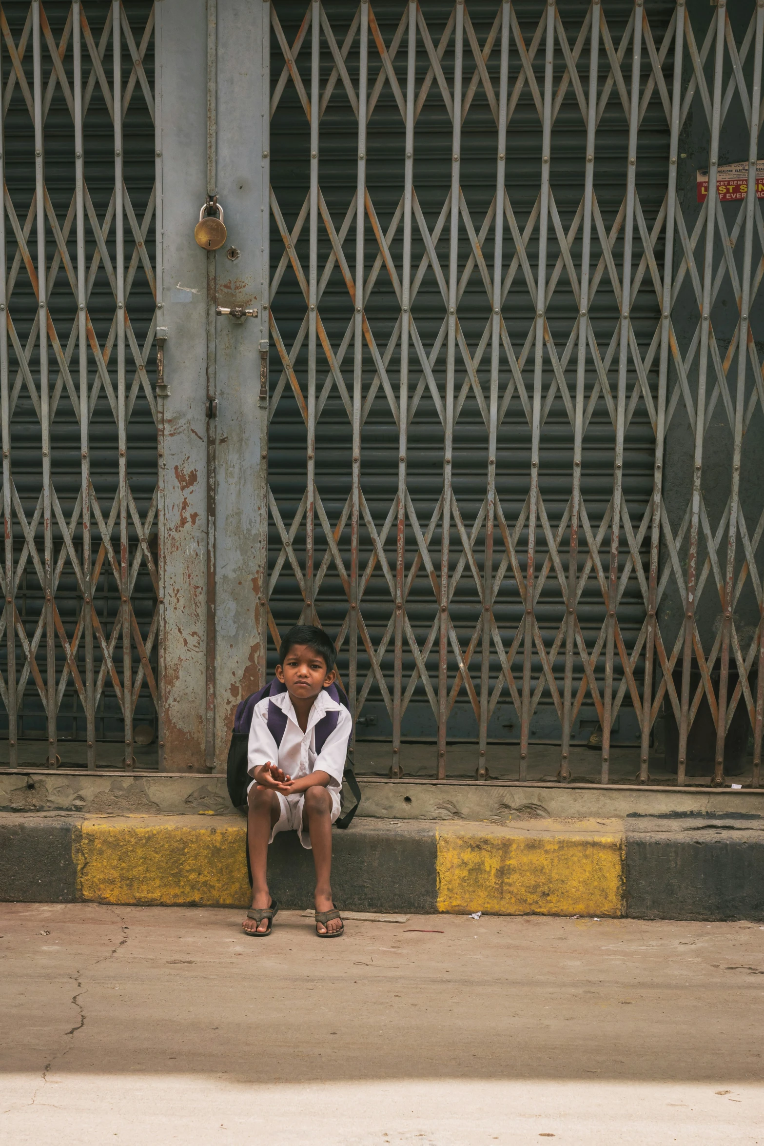 a  sitting on the ground