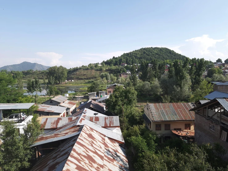 a view from the air looking down on rooftops and houses