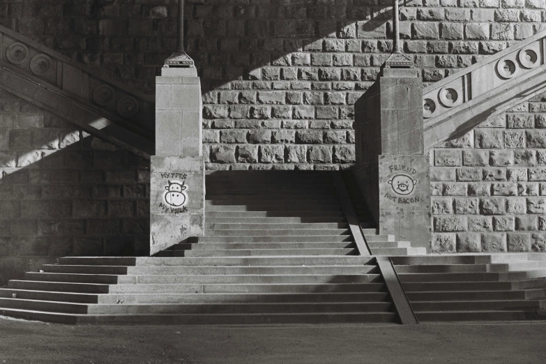 two concrete staircases that lead up to a building