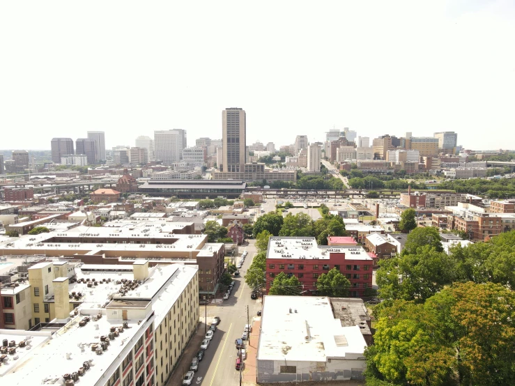 a city view from the roof of a building in the foreground