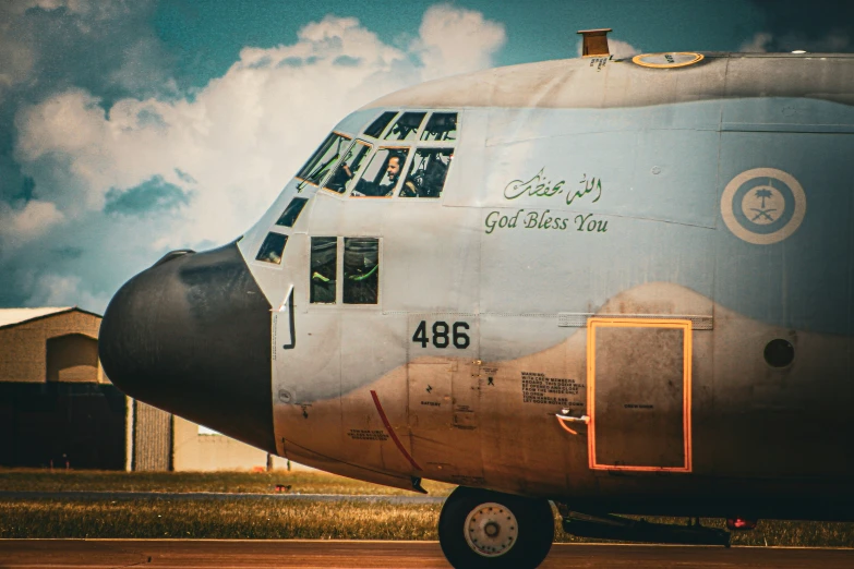 the nose of an airplane on a runway