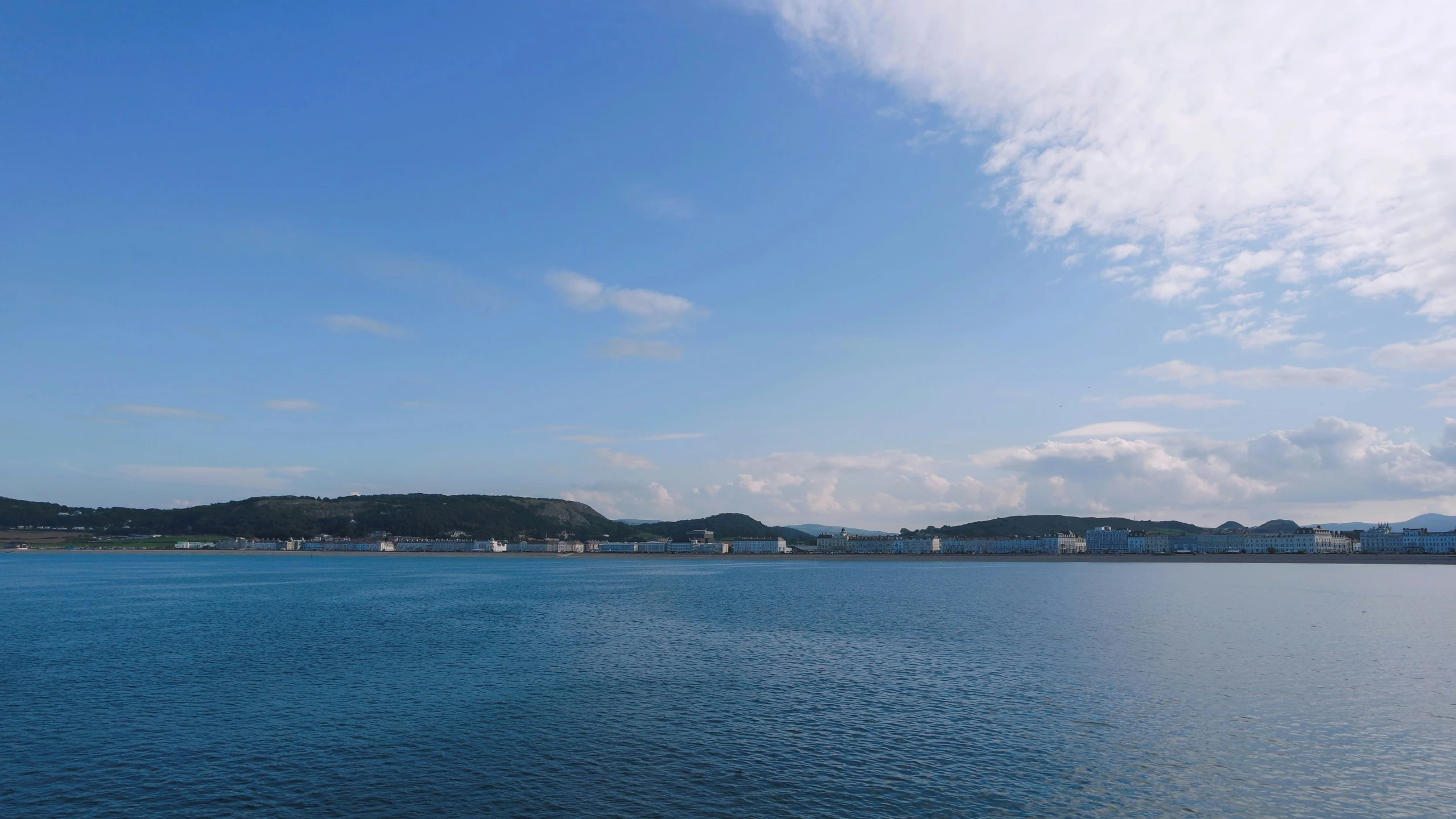 the view out of a boat, shows the sky and water