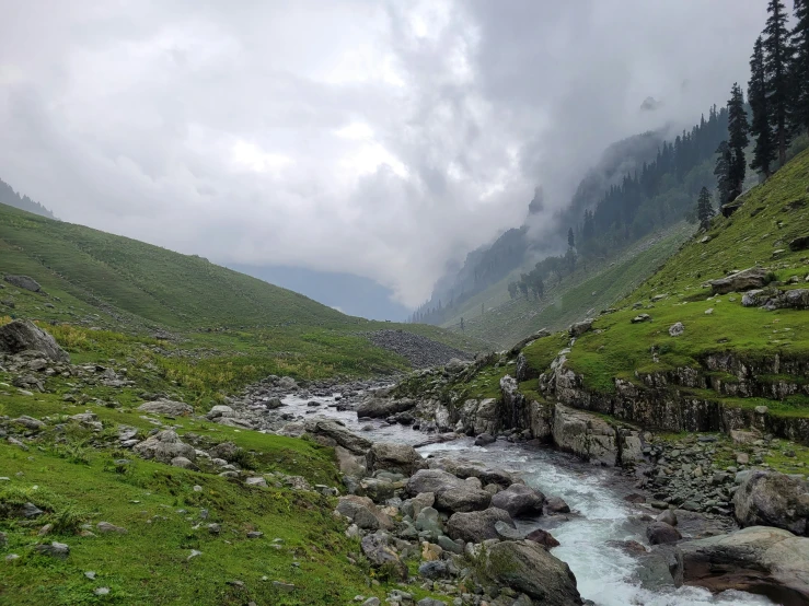 the mountain river is running along its side