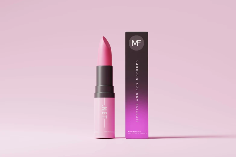 a pink lipstick on a pink surface, next to a black box