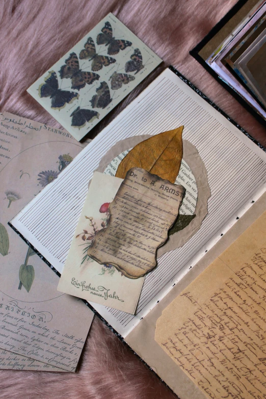 old papers are shown on a table with papers