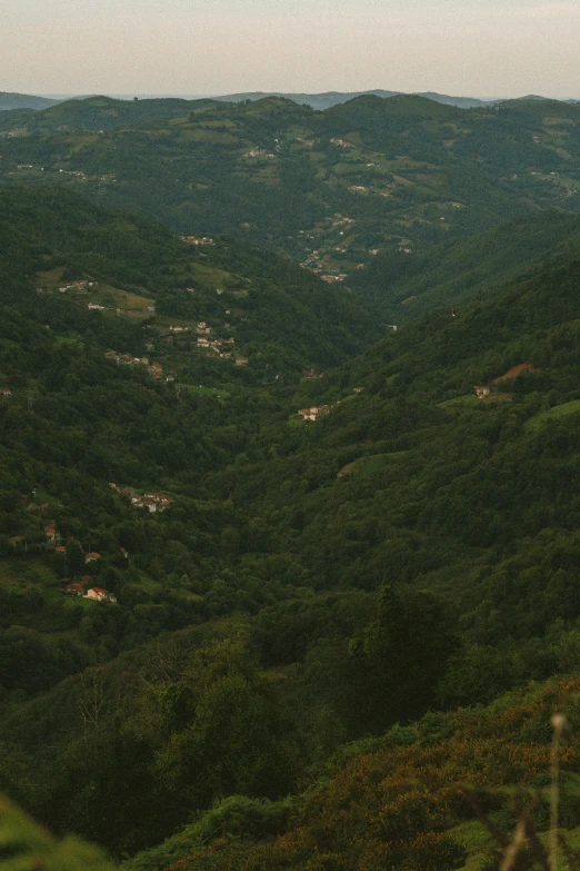 mountains and valleys are seen from the air