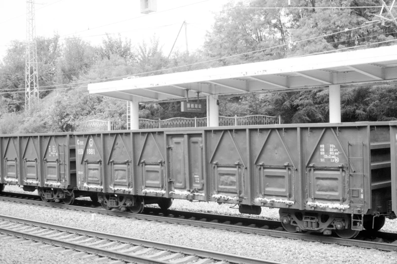 an old coal car sitting on the tracks