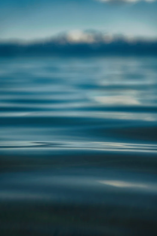 a blurry pograph of the ocean water