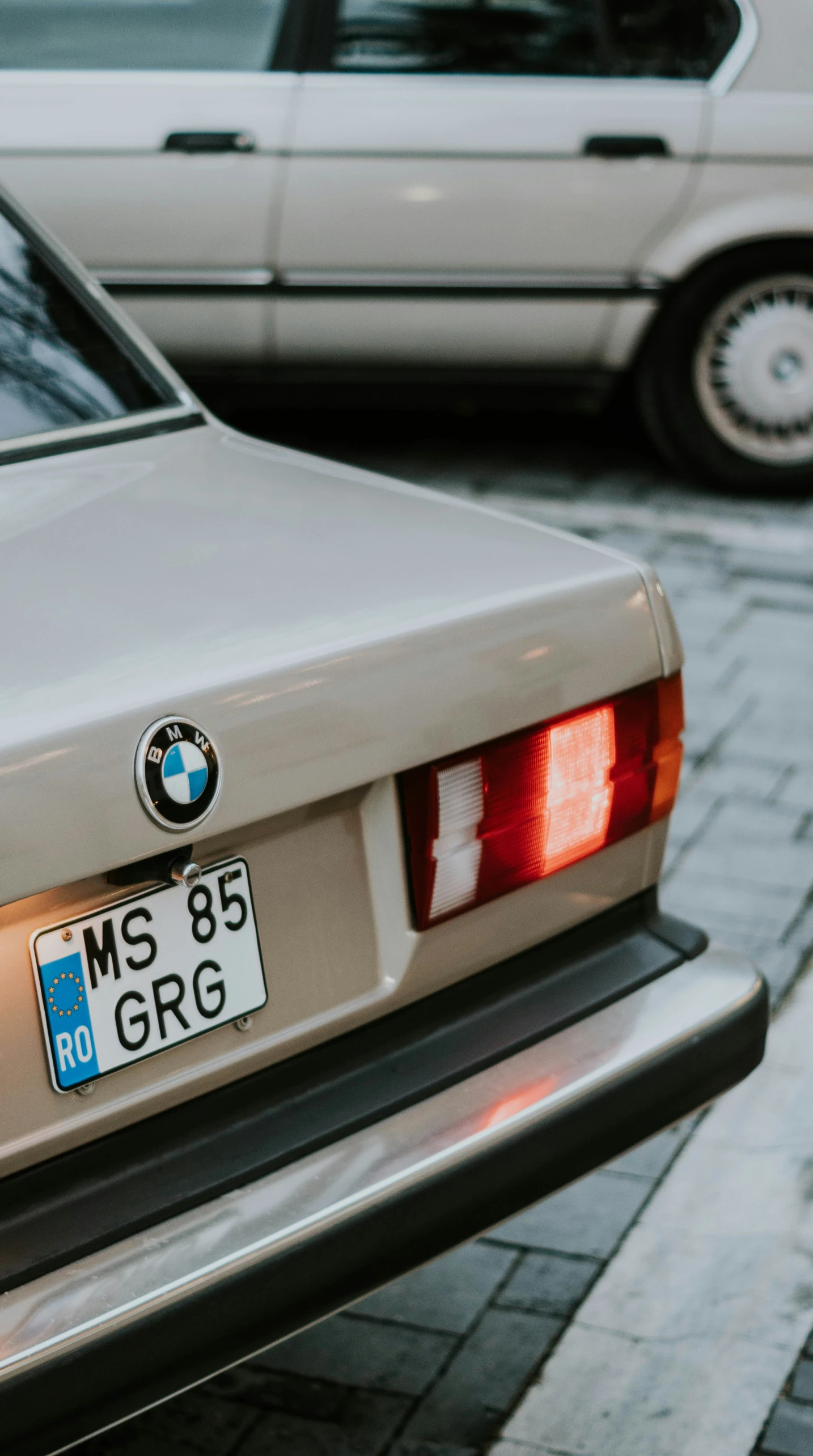 closeup of bmw motor car on street in urban area