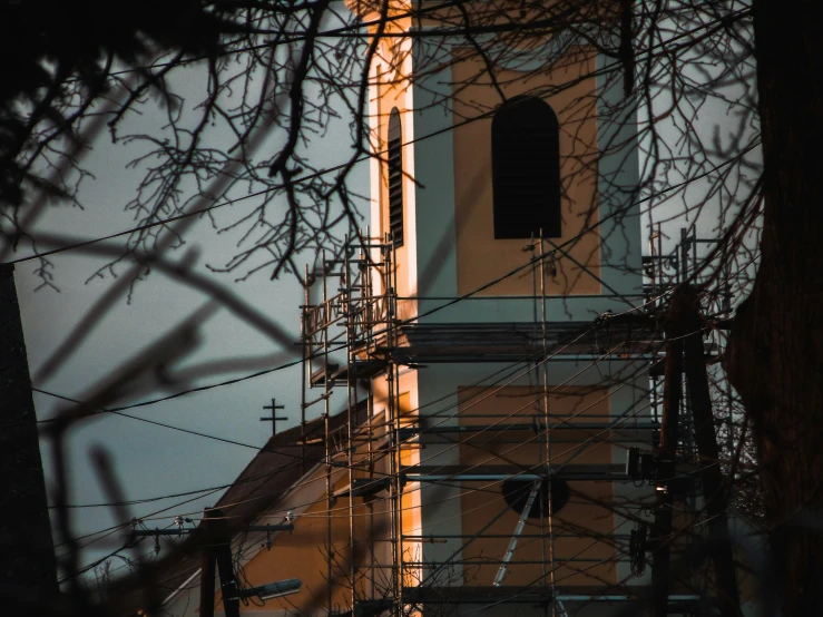 an image of the back of a church in silhouette