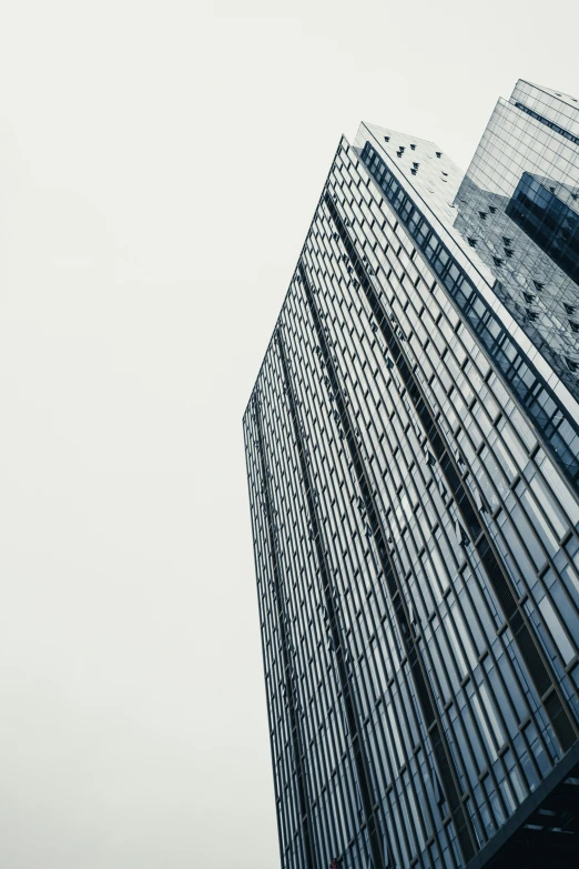 tall building with various window views from the ground