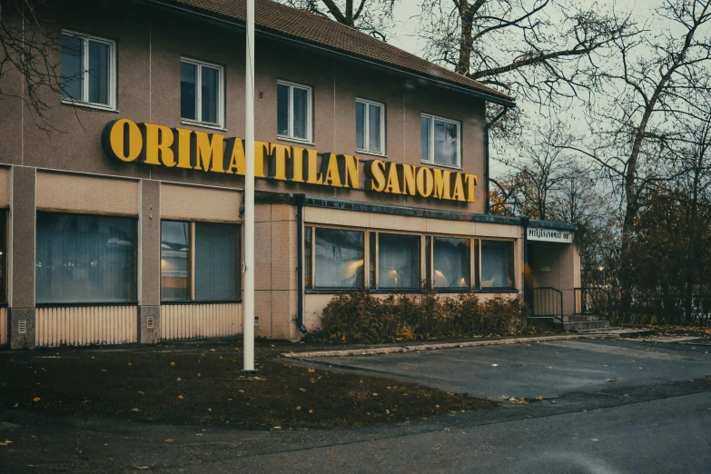 a large building with an oriental restaurant in the corner