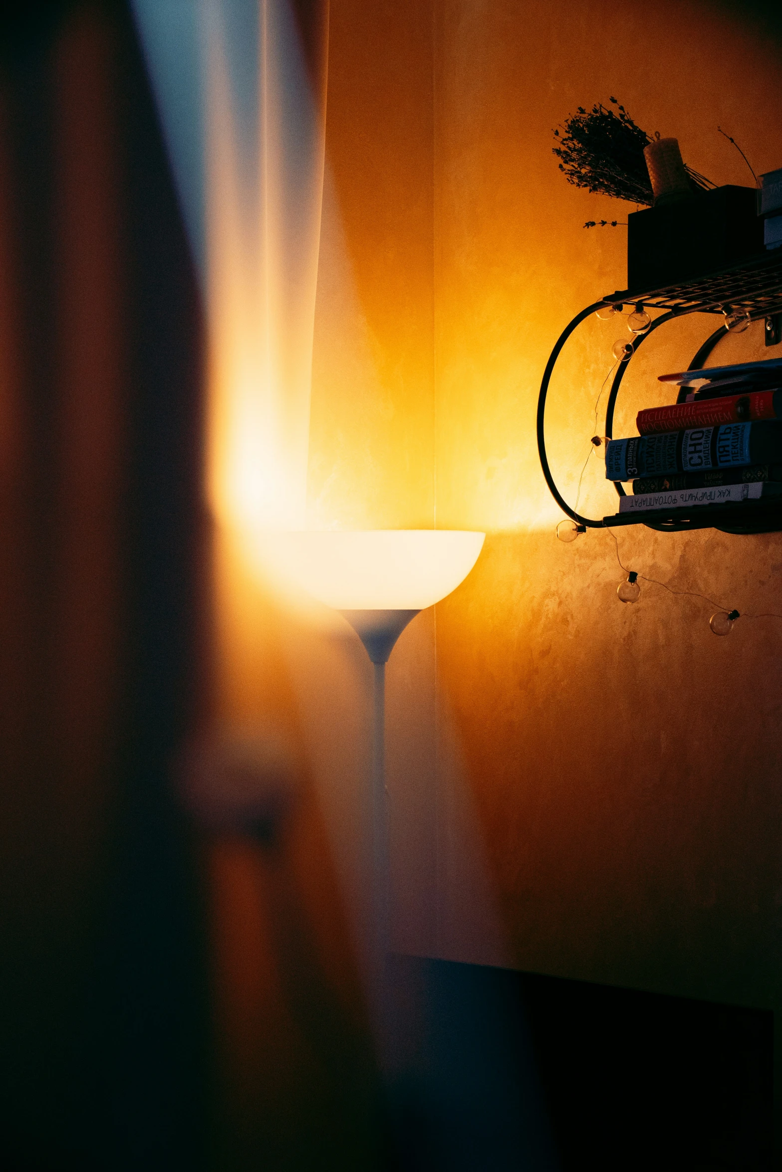 a po taken from behind of a desk with a light and wires on top