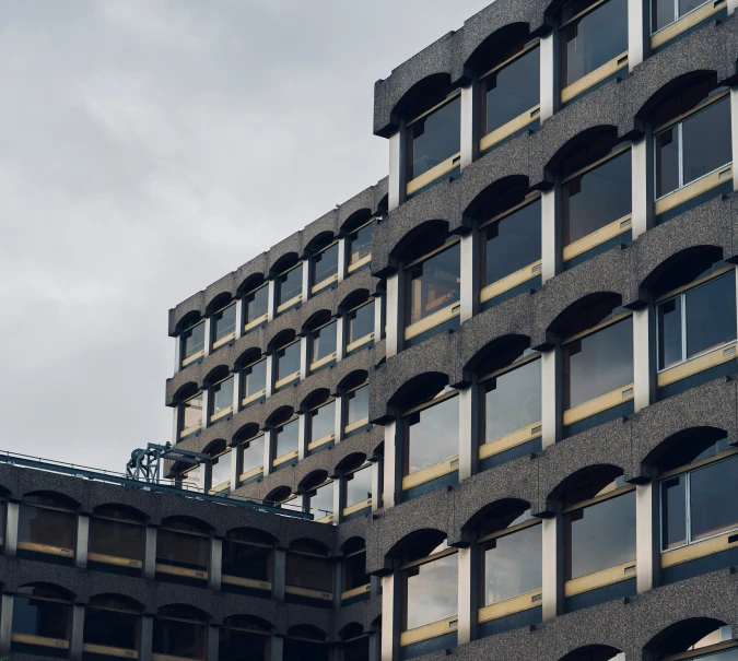 a building made of several balconies and some windows