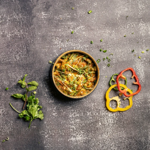 some sort of vegetable dish with scissors next to it