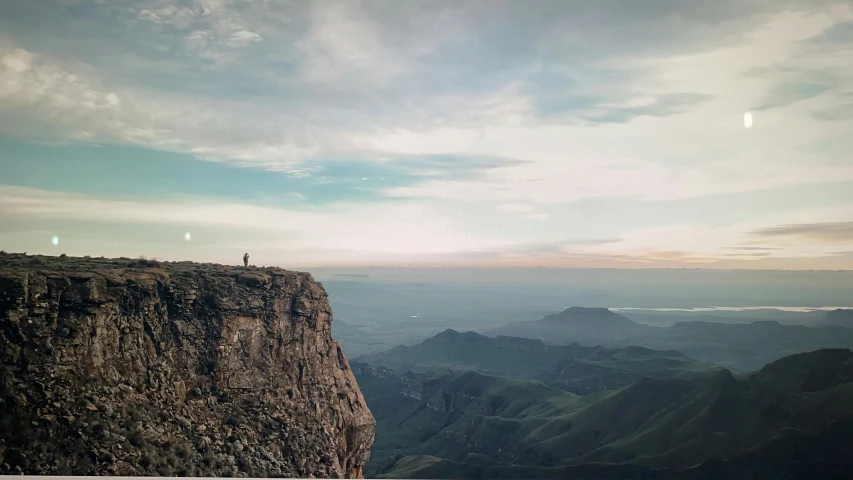 a mountain with many mountains in the distance