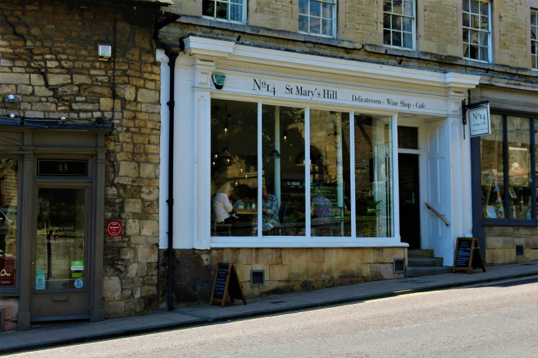 a building with windows and signs inside it