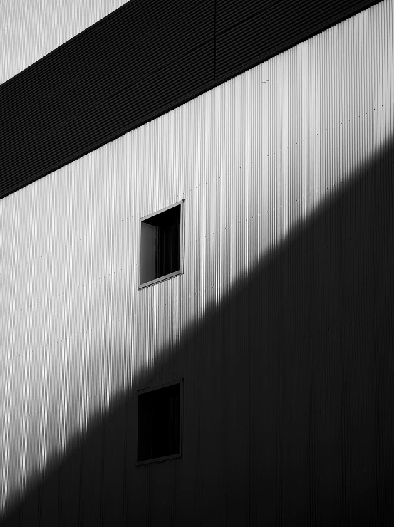 a window is sitting next to a building