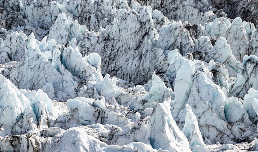 several large ice pieces in the ocean