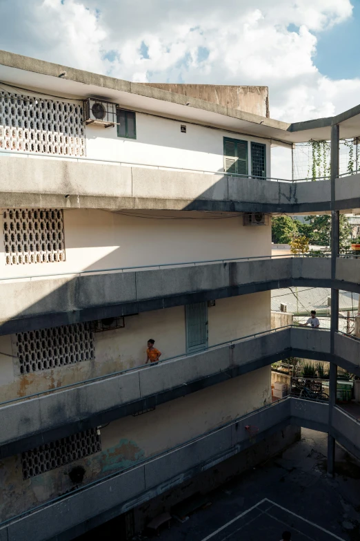 a view from the top floor of a building with windows