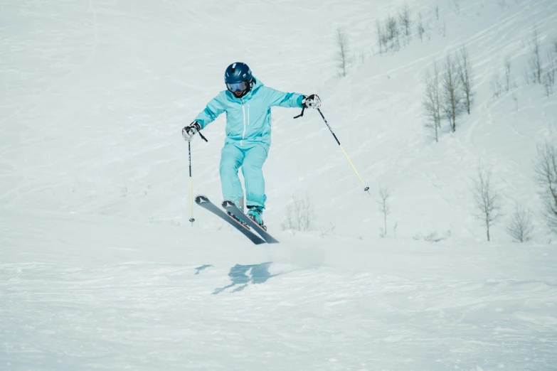 a person is riding skis in the snow