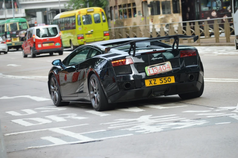 an exotic sports car is seen in traffic