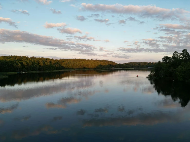 a calm river in the middle of the day