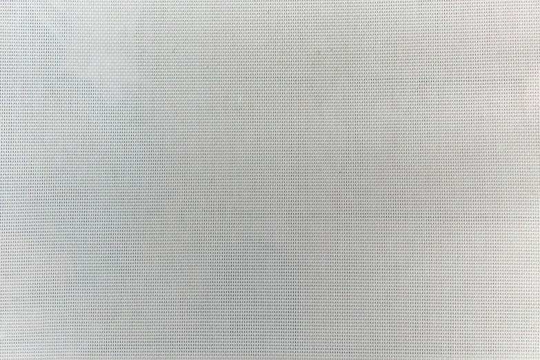 a white wall made up of various dots