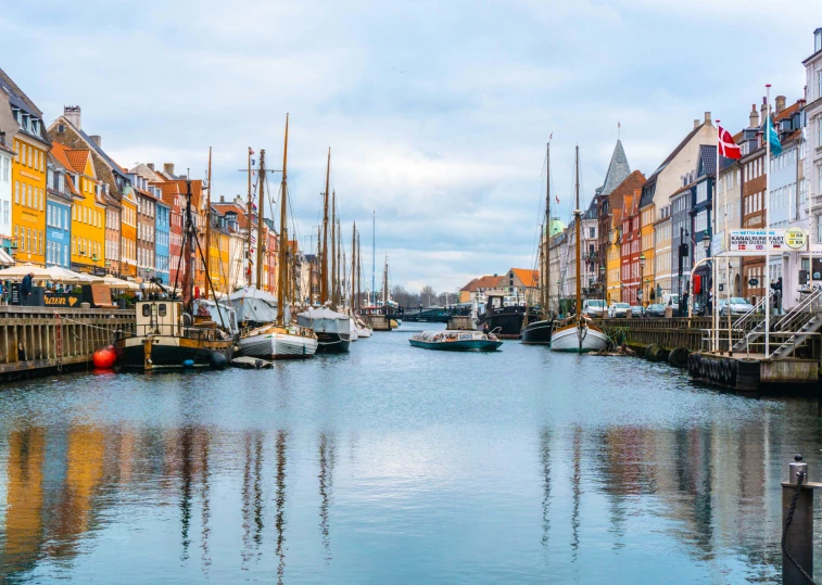 a waterway full of boats surrounded by buildings