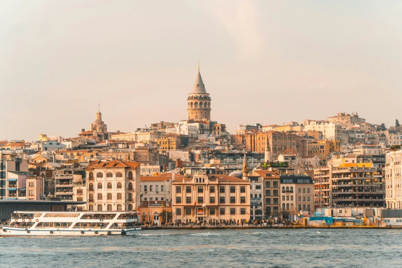 city and river with boats in front